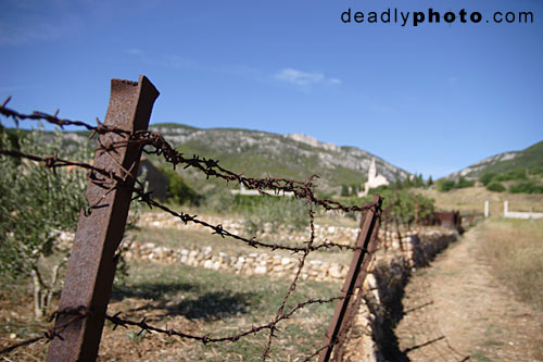 Barbed wired fence, near town of Komiza, Island of Vis, Croatia